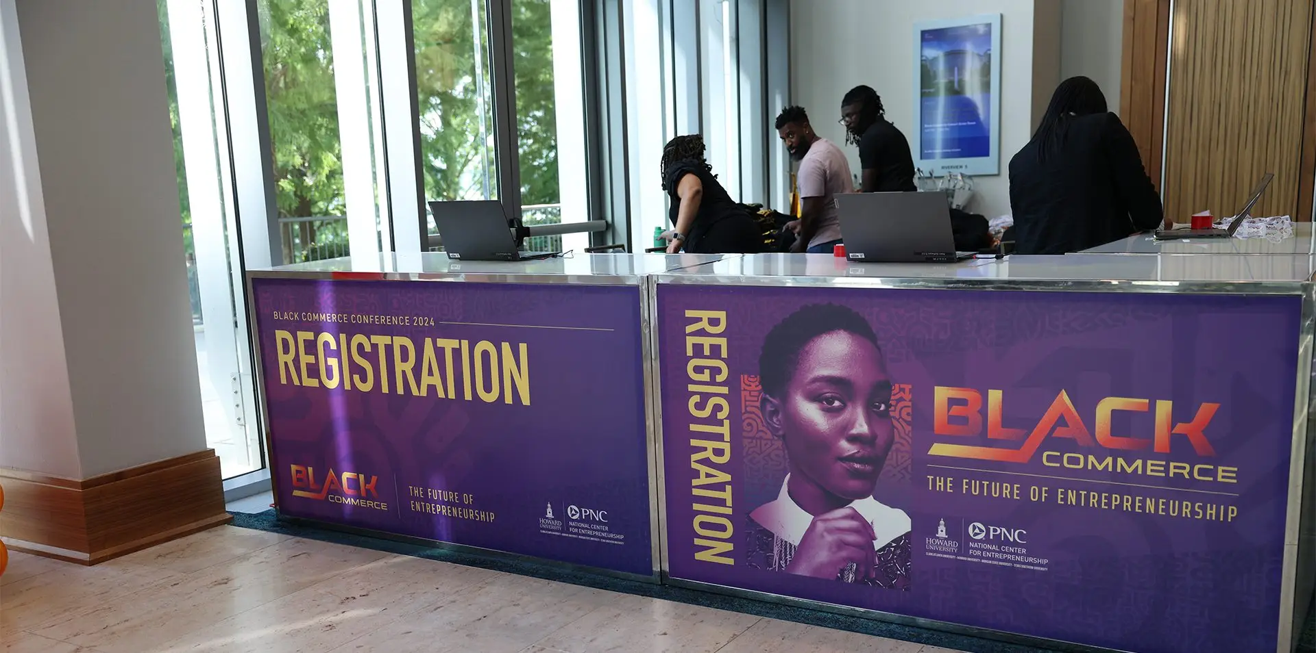 Registration desk branding at Black Commerce Conference