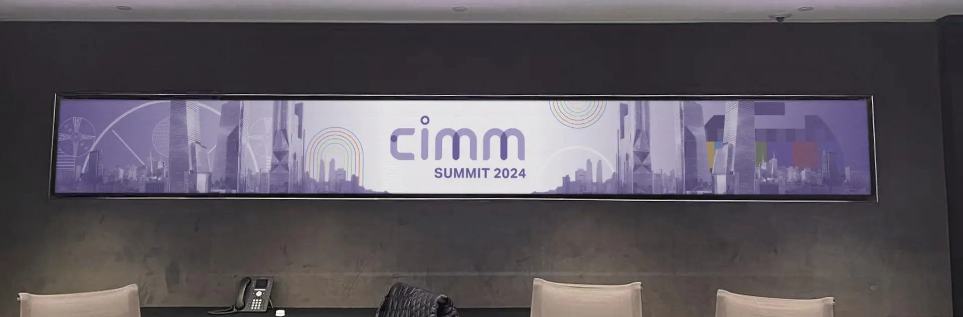 CIMM Summit 2024 banner above a reception area