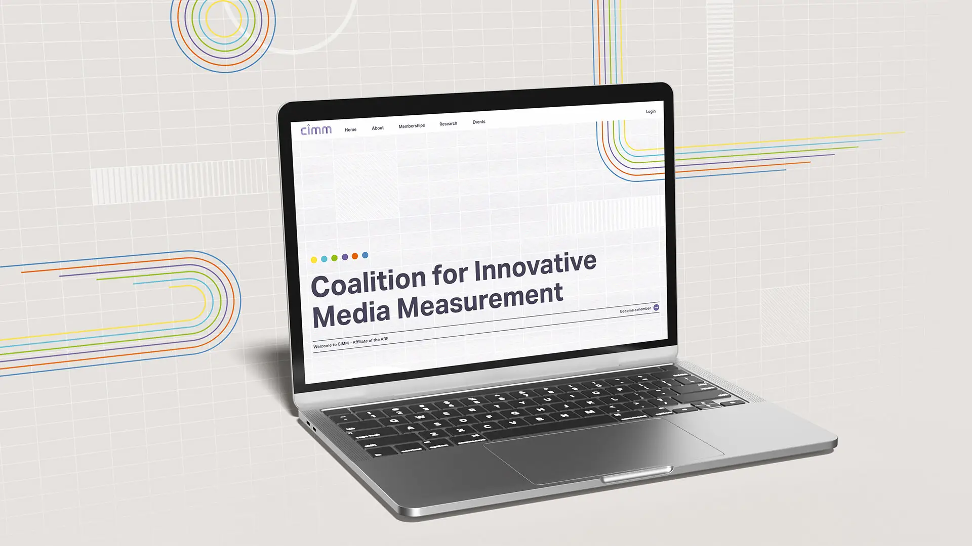 CIMM website homepage design on a laptop
